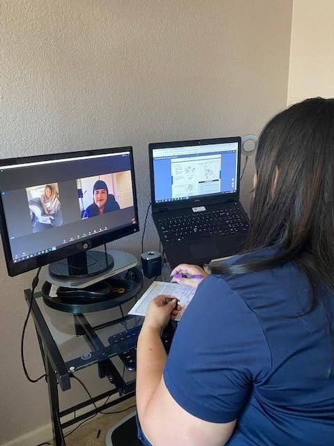 Image of Child Passenger Safety Technician on video call during virtual car seat inspection