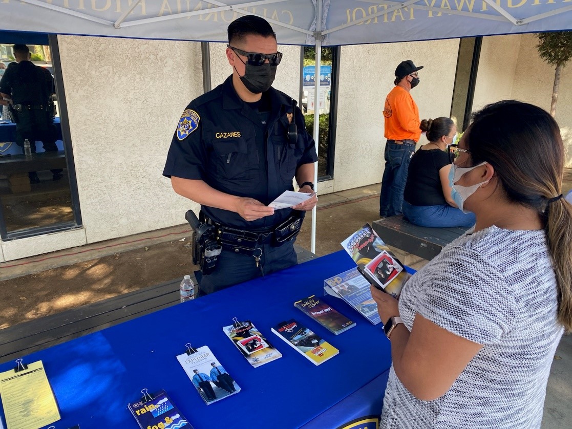 California Highway Patrol officer at display booth