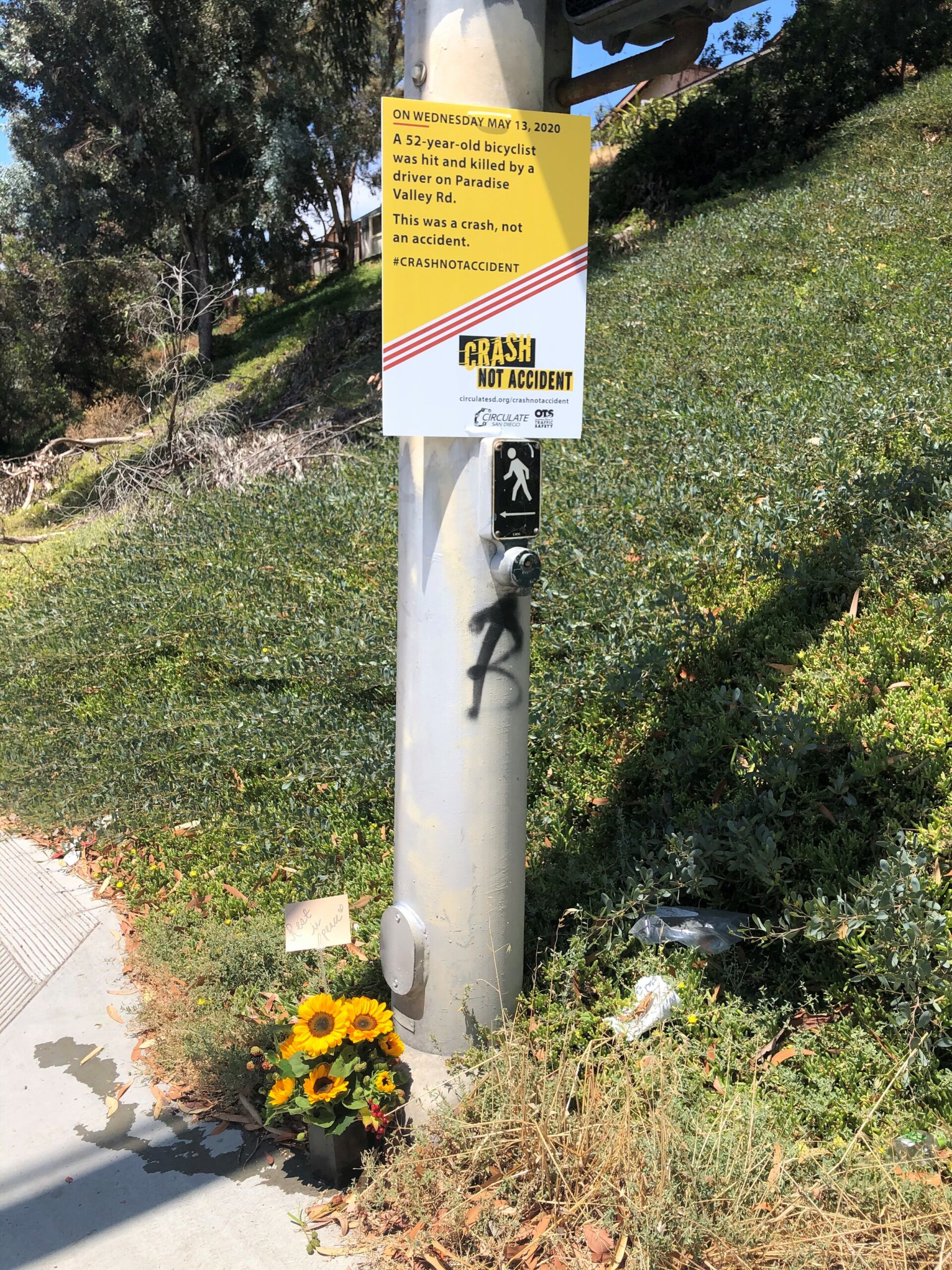 Image of memorial with flowers at scene of deadly crash